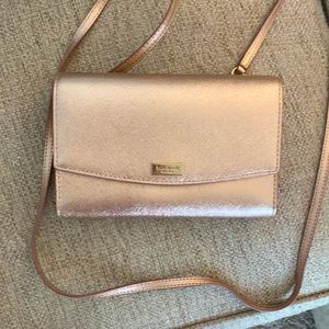 Rose Gold Kate spade clutch wallet with optional cross body strap